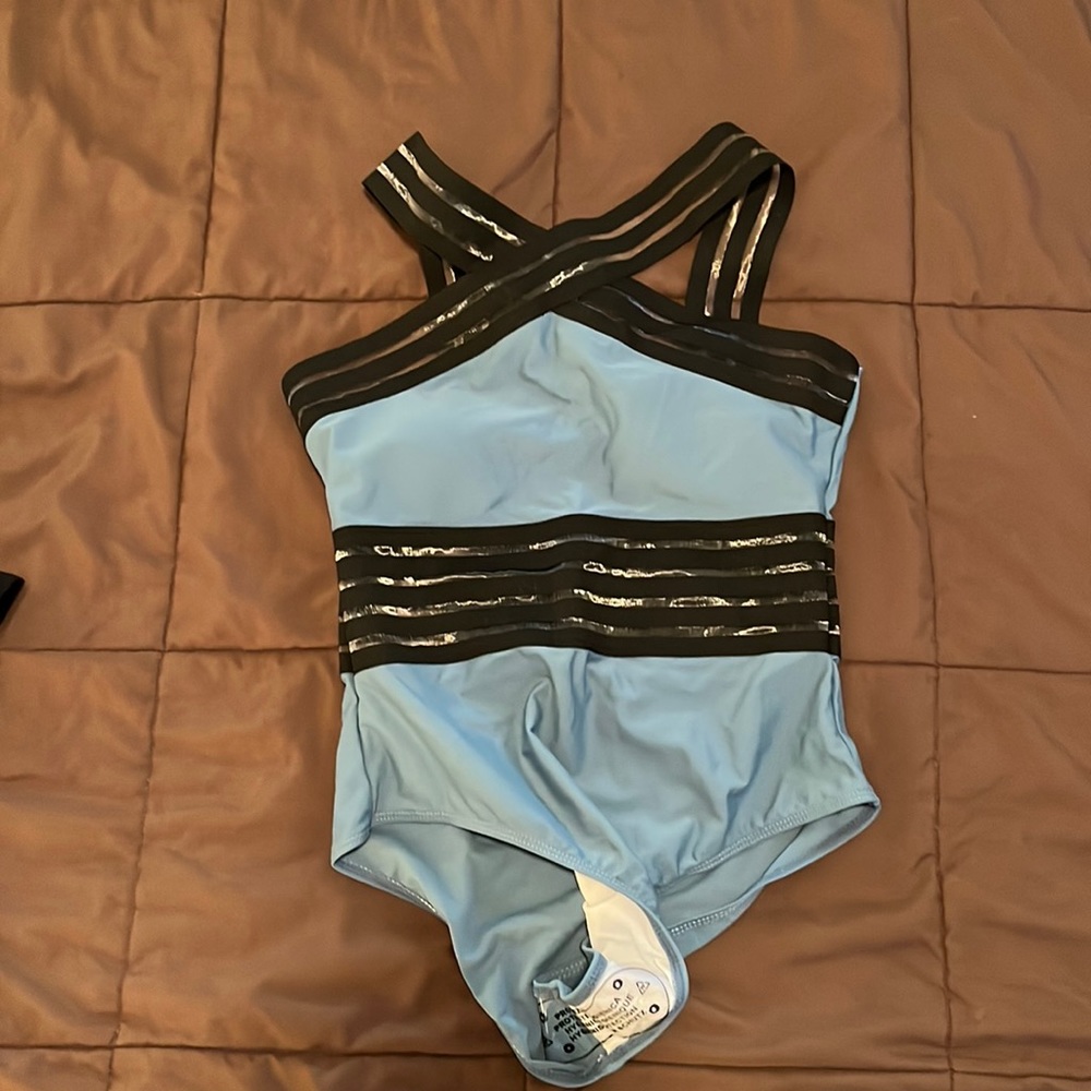 Bathing suit never used still have bottom bath ring suit sticker on it